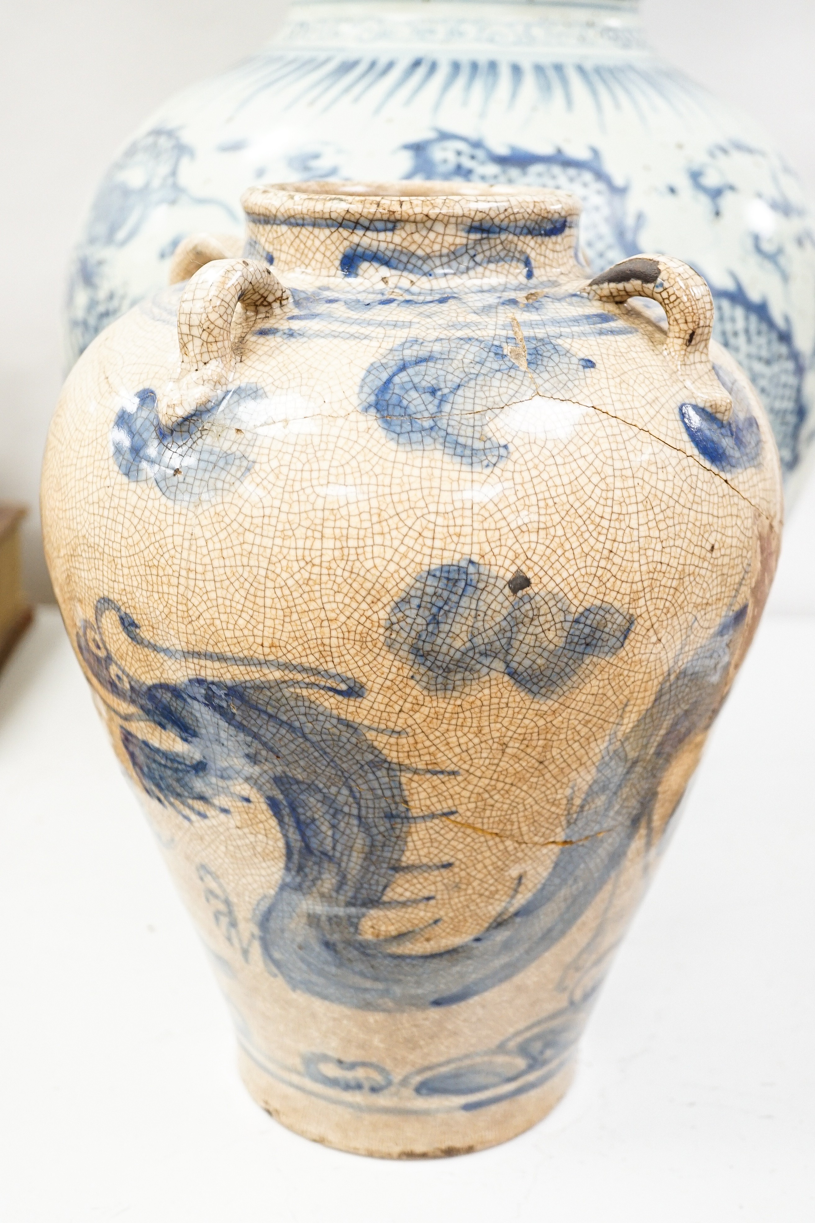 A large Chinese blue and white 'dragon' double gourd vase, 64cm high and an Annamesse style blue and white crackle glaze jar